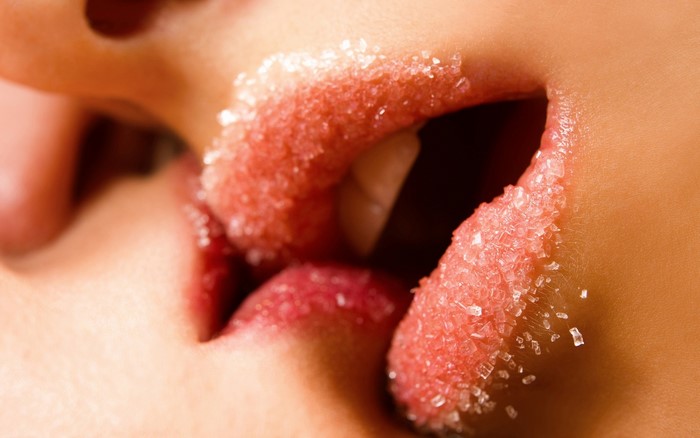 Close-up of Sugar-Coated Lips in an Intimate Moment