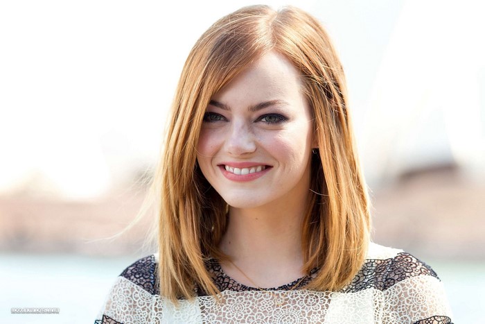 Emma Stone smiling outdoors