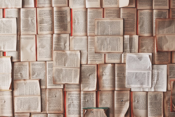 Wall Covered with Open Vintage Books