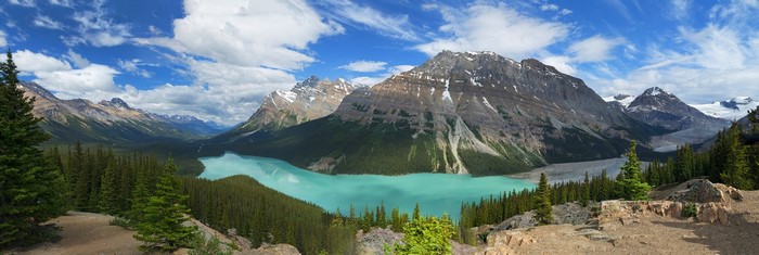 Turquoise Lake Amid Banff Mountains and Forest