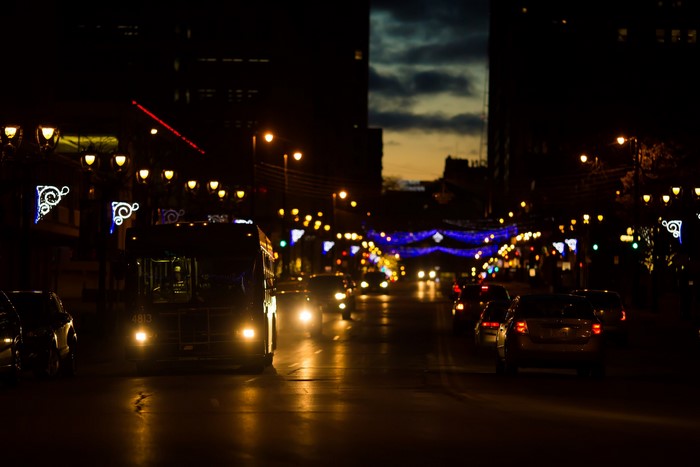 Night street with bus and cars, city lights