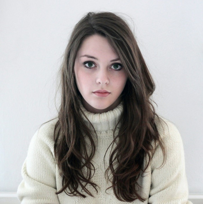 Imogen Dyer in White Sweater with Long Brown Hair