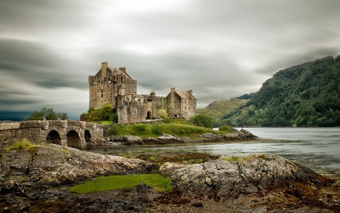 Eilean Donan Castle with Stone Bridge and Clouds