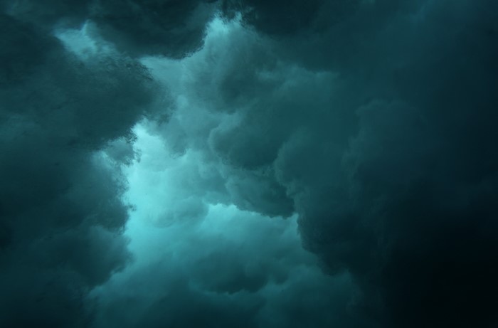 Dark underwater clouds with light