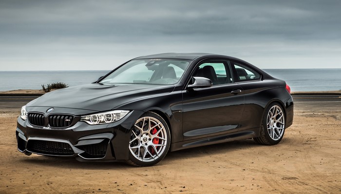 Black BMW M4 Coupe Parked by the Ocean