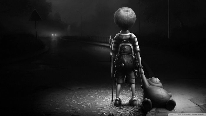 Boy with backpack and teddy bear on a dark road