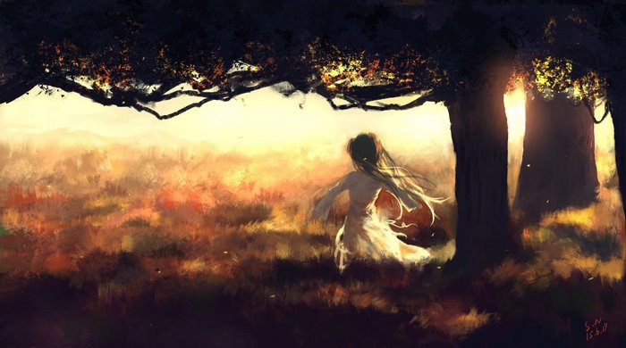 Girl running through a sunlit forest