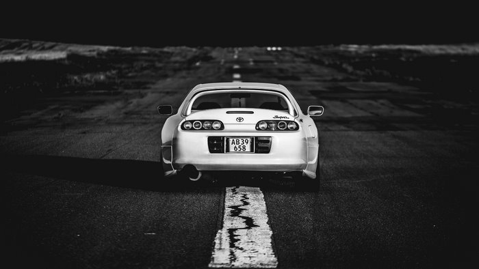 Toyota Supra MK4 Rear View on Road