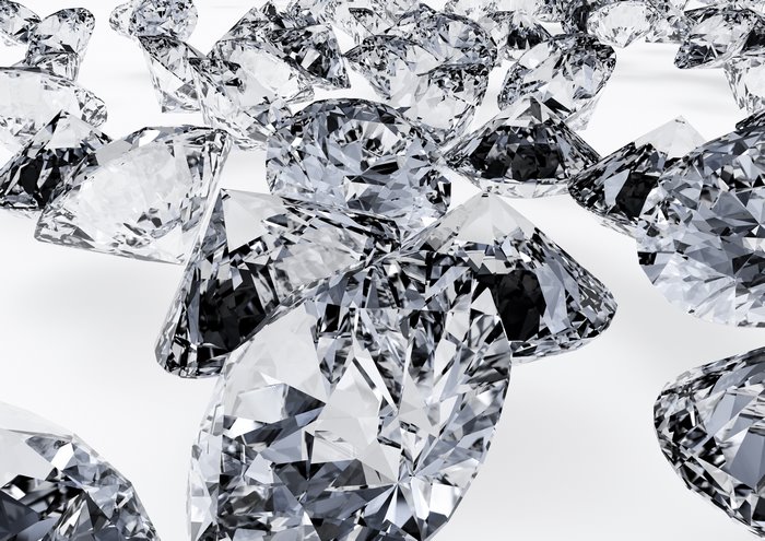 Scattered diamonds on a white background
