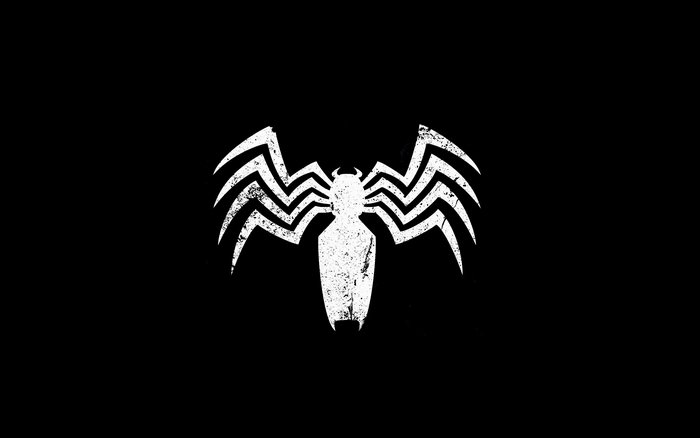 Venom spider logo on black background