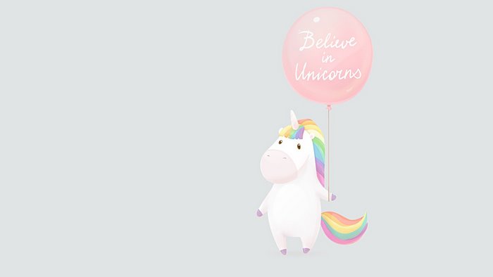 Unicorn holding a pink balloon with text