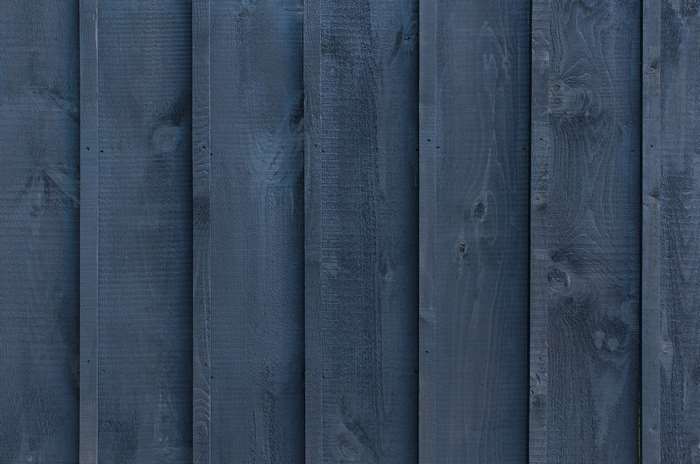 Dark blue wooden fence planks 4K