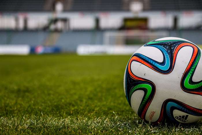 Adidas Brazuca Football on Stadium Grass