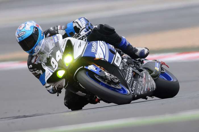 Yamaha motorcycle racer number 94 on a race track