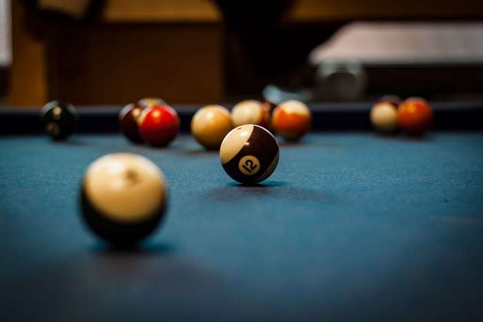 Billiard balls on a pool table 4K