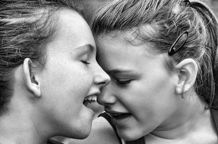 Two young girls sharing a moment