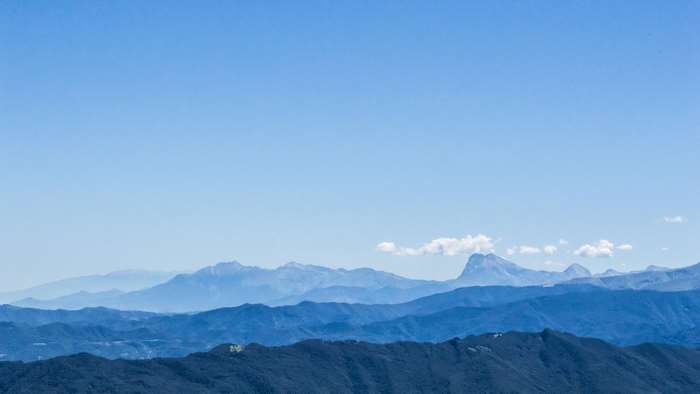 Mountain range landscape under a clear blue sky