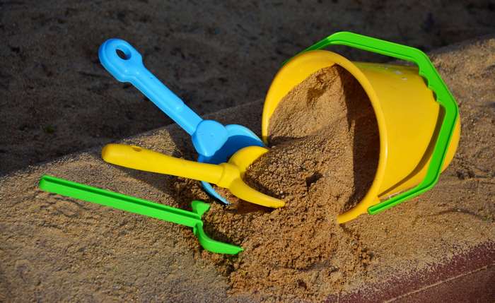 Sand bucket and toys in a sand pit 4K