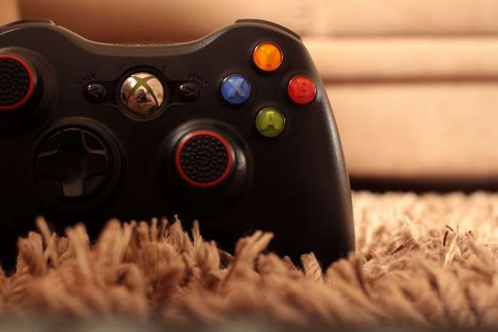 Xbox 360 controller on a carpet