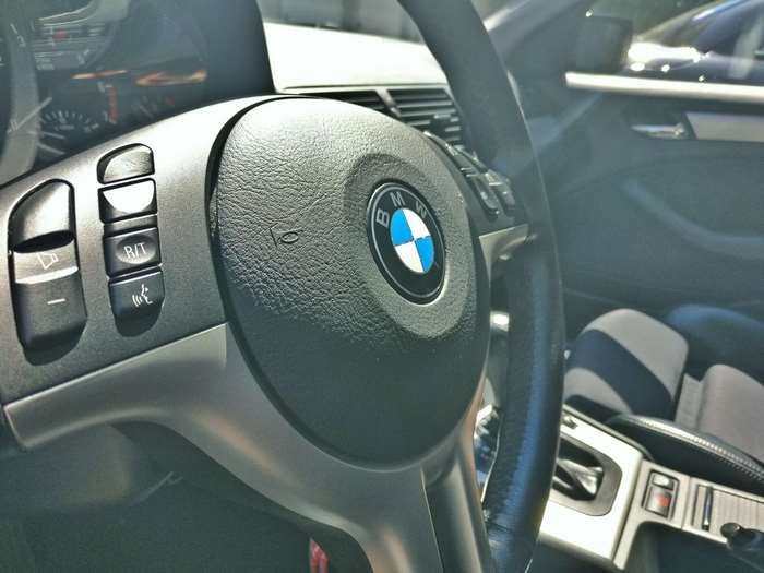 BMW car interior with steering wheel