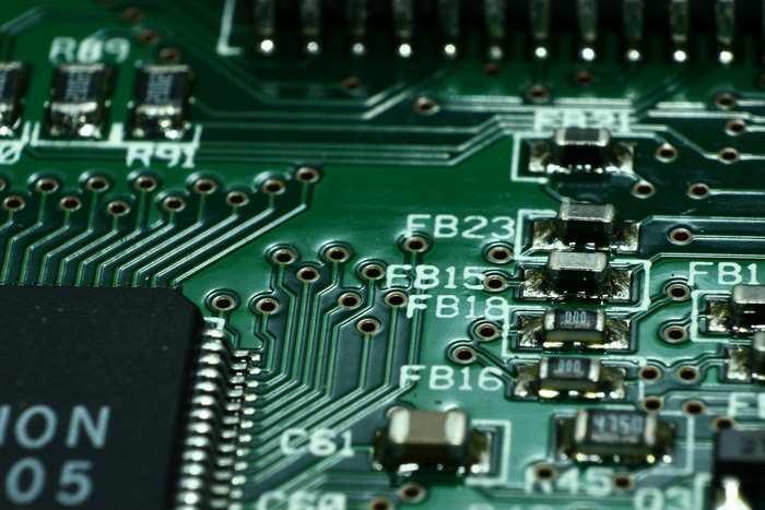 Close-up of a green circuit board with components