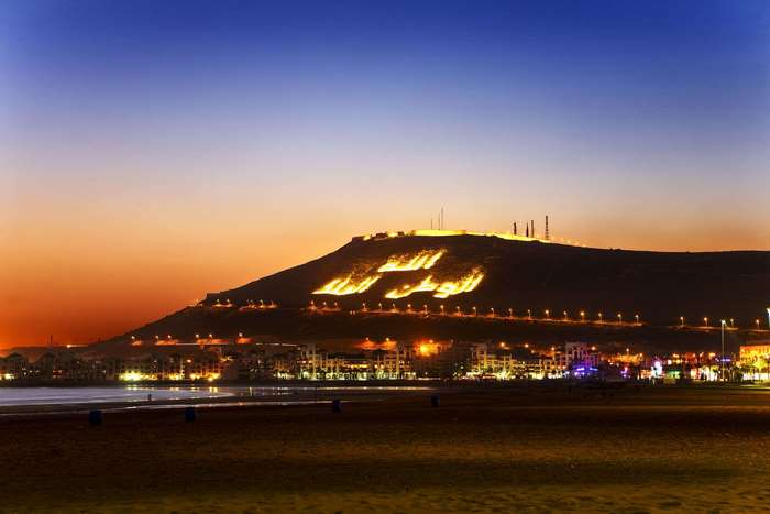 Agadir city lights on a hill at dusk