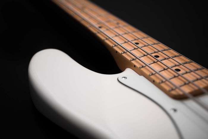 White Fender Jazz Bass Guitar Close-up