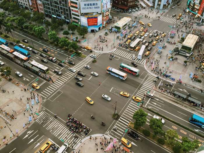 Busy City Intersection with Traffic and Pedestrians