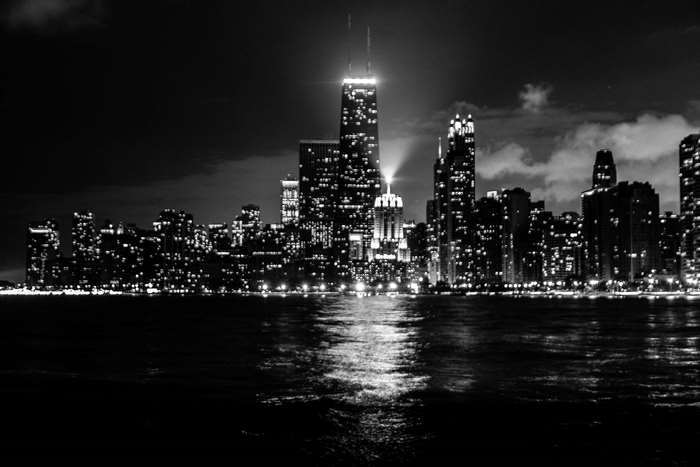 Chicago skyline at night with Lake Michigan
