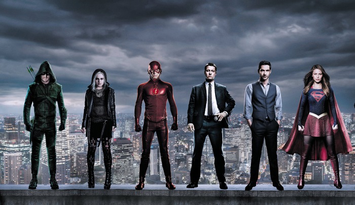 Arrow, The Flash, Lucifer, and Supergirl standing on a rooftop