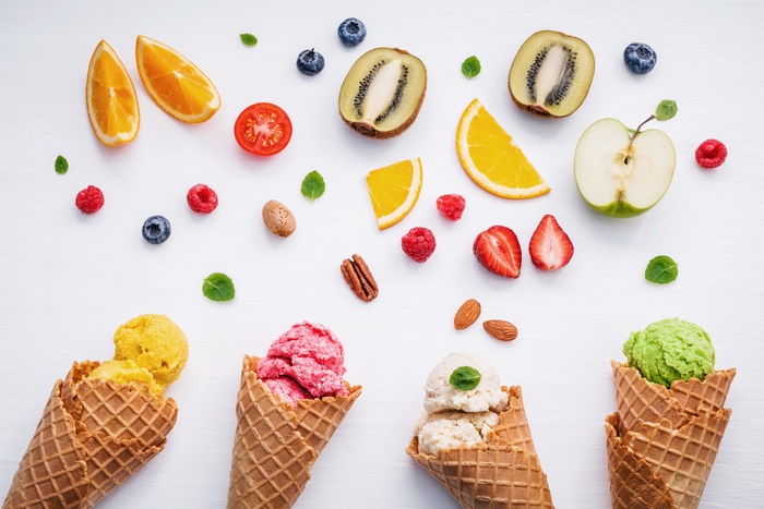 Still life of fruit and ice cream cones