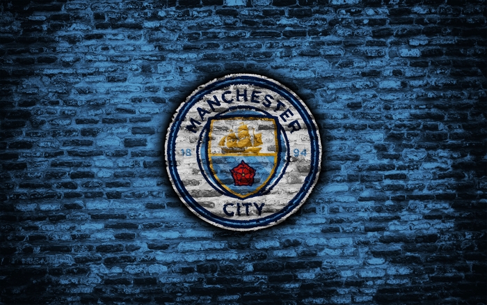 Manchester City F.C. Logo on Brick Wall
