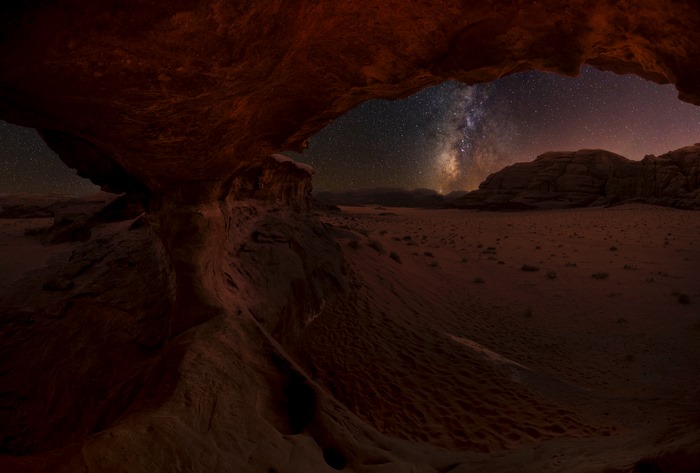 Desert landscape with rock formations and the Milky Way