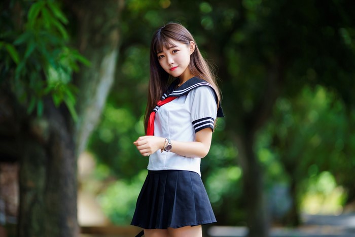 Asian Girl in School Uniform with Brown Eyes