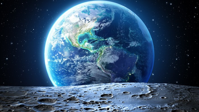 Earth and Moon surface with stars