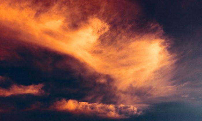 Orange sunset clouds in the sky