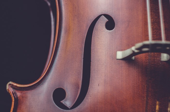 Close up of a vintage cello or violin