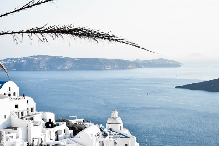 White buildings on Santorini island overlooking the Aegean Sea