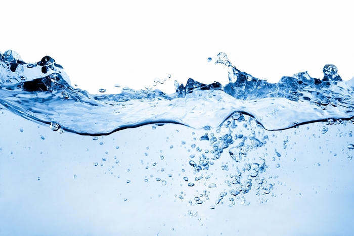 Water surface with bubbles and splashes