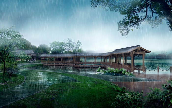 Covered bridge over a lake during rain