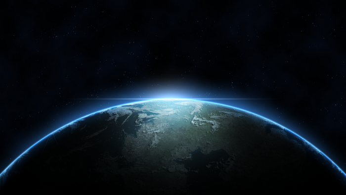 Earth from space with glowing atmosphere