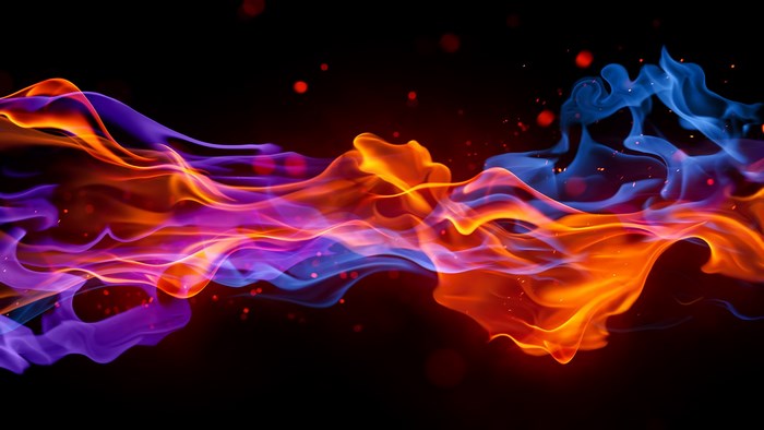 Abstract colorful smoke and fire on black background