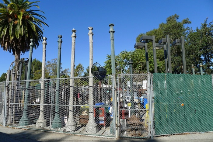 Streetlights behind a chain-link fence in Los Angeles