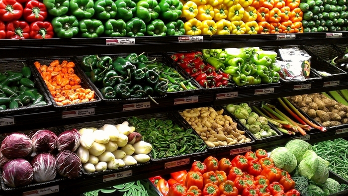 Assortment of fresh vegetables and fruits on display