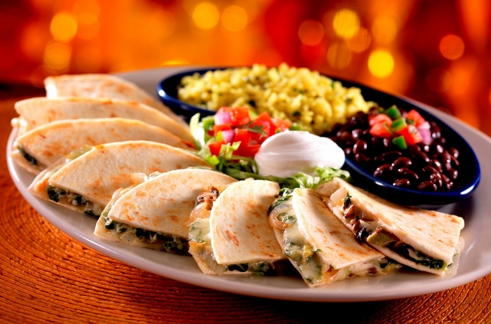 Quesadillas with rice, beans, and sour cream