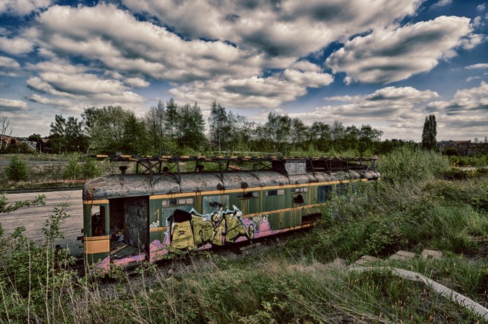 Abandoned tram covered in graffiti
