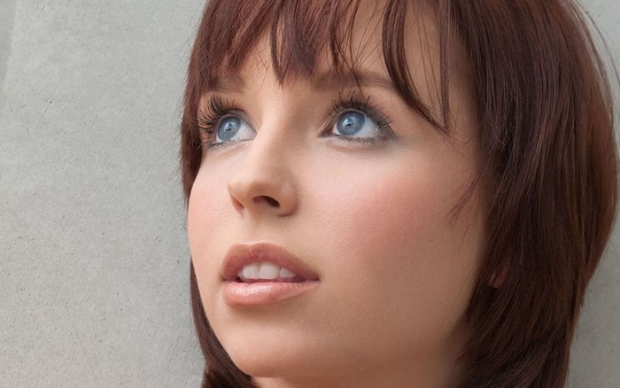 Young Woman with Blue Eyes Looking Upward