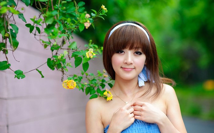 Mikako Zhang in Blue Dress with Yellow Flowers
