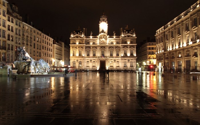 Place Bellecour at night with fountain and Hotel de Ville, Lyon