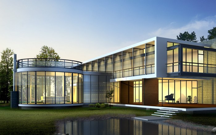 Modern house with glass walls and a pond